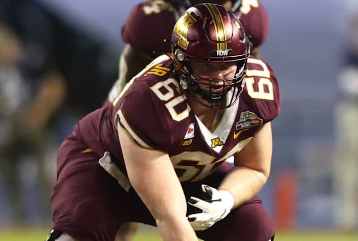 Minnesota Golden Gophers center John Michael Schmitz (60) against the West Virginia Mountaineers in the Guaranteed Rate Bowl at Chase Field.